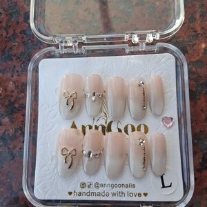 Elegant Nude Press-On Nails with Gold Accents